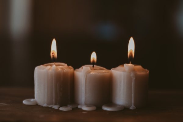 Three burning candles